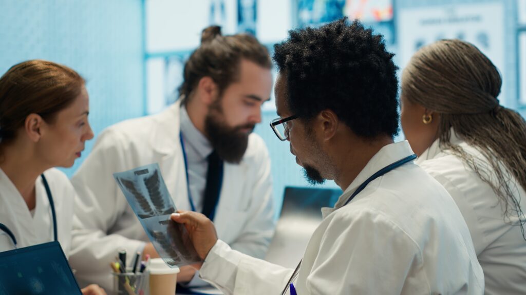 healthcare experts team reviews x ray results to find best treatment plan
